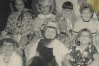 Kathy as a child with her brownie troop