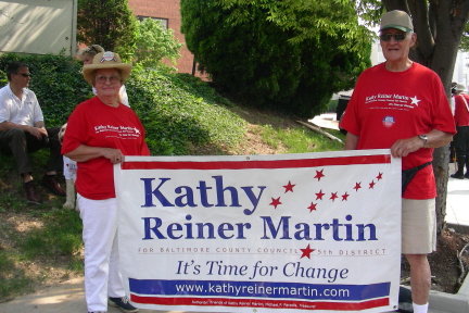 Friends of Kathy Reiner Martin with banner before the parade