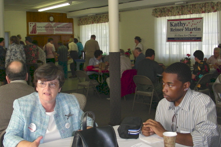 Kathy talking with supporters at the "Chili for Change" fundraiser