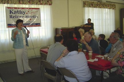 Kathy speaking at the "Chili for Change" fundraiser