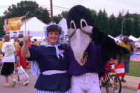 Kathy Reiner Martin with the Ravens Mascot at the Perry Hall Town Fair