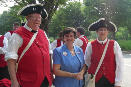 Kathy Reiner Martin with members of the Monumental City Ancient Fife & Drum Corps